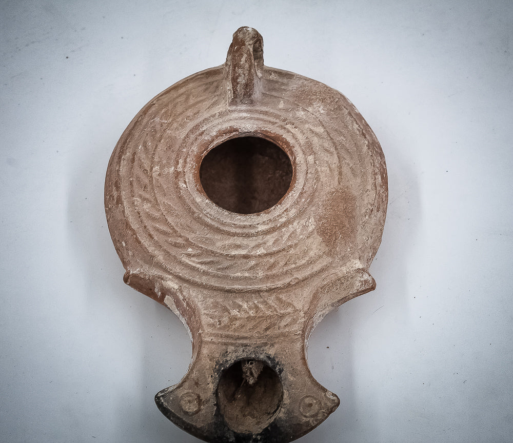 A JEWISH TERRACOTTA OIL LAMP (Daroma lamps)