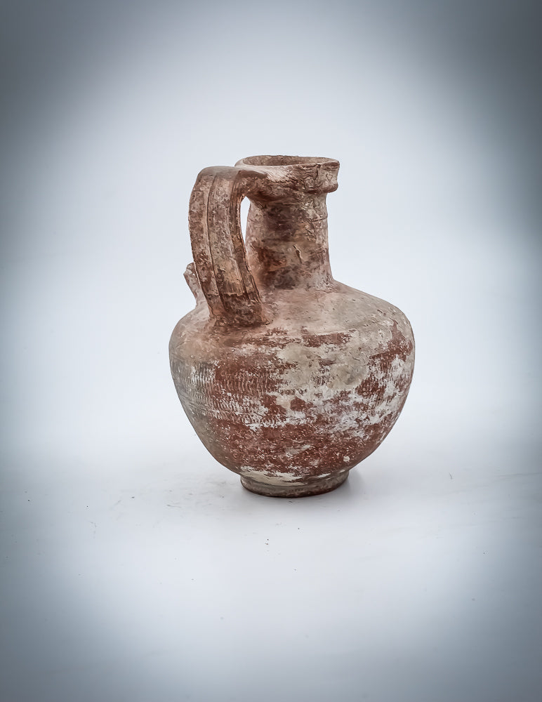 A Nabatean Terracotta Juglet With Saucer