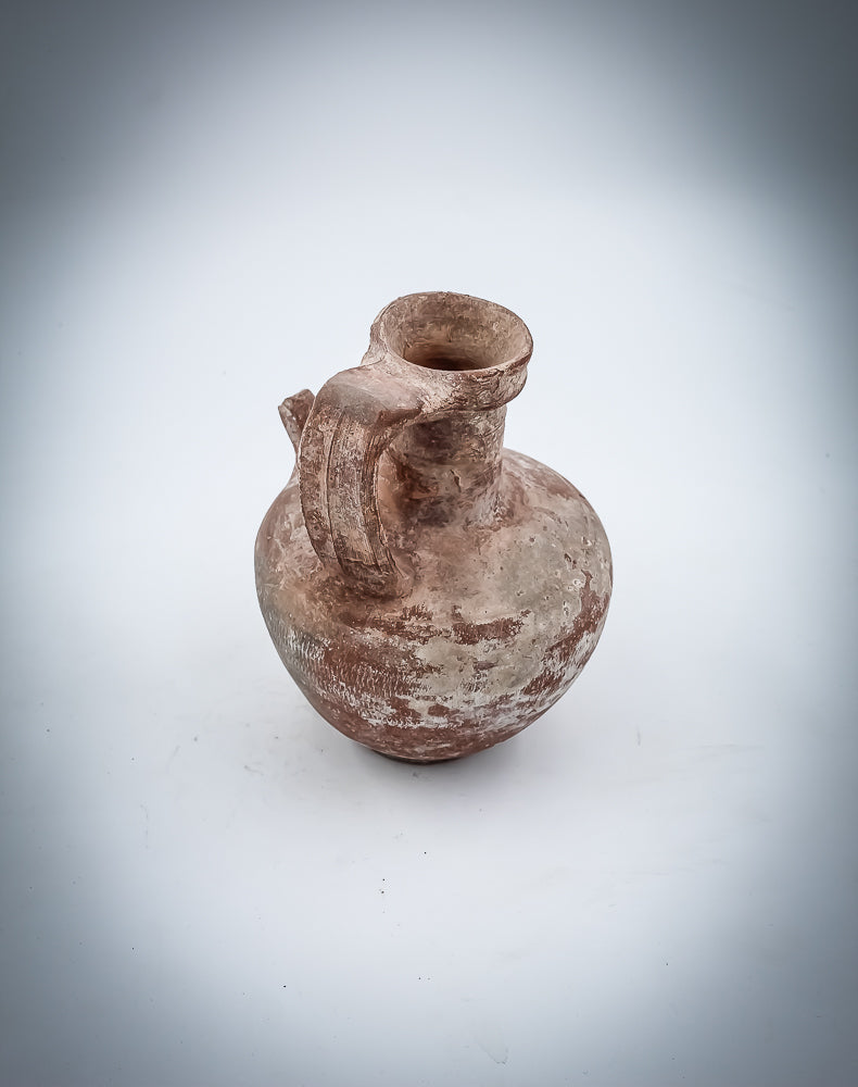 A Nabatean Terracotta Juglet With Saucer