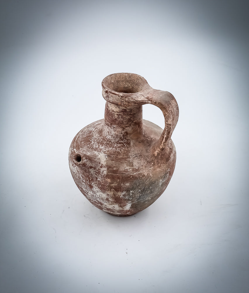 A Nabatean Terracotta Juglet With Saucer