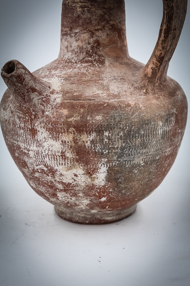 A Nabatean Terracotta Juglet With Saucer