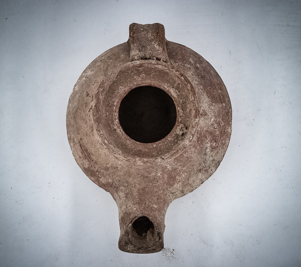 A TERRACOTTA “SHABBAT” OIL LAMP