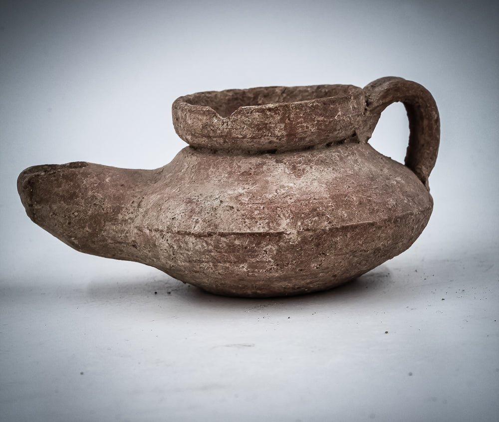 A TERRACOTTA “SHABBAT” OIL LAMP