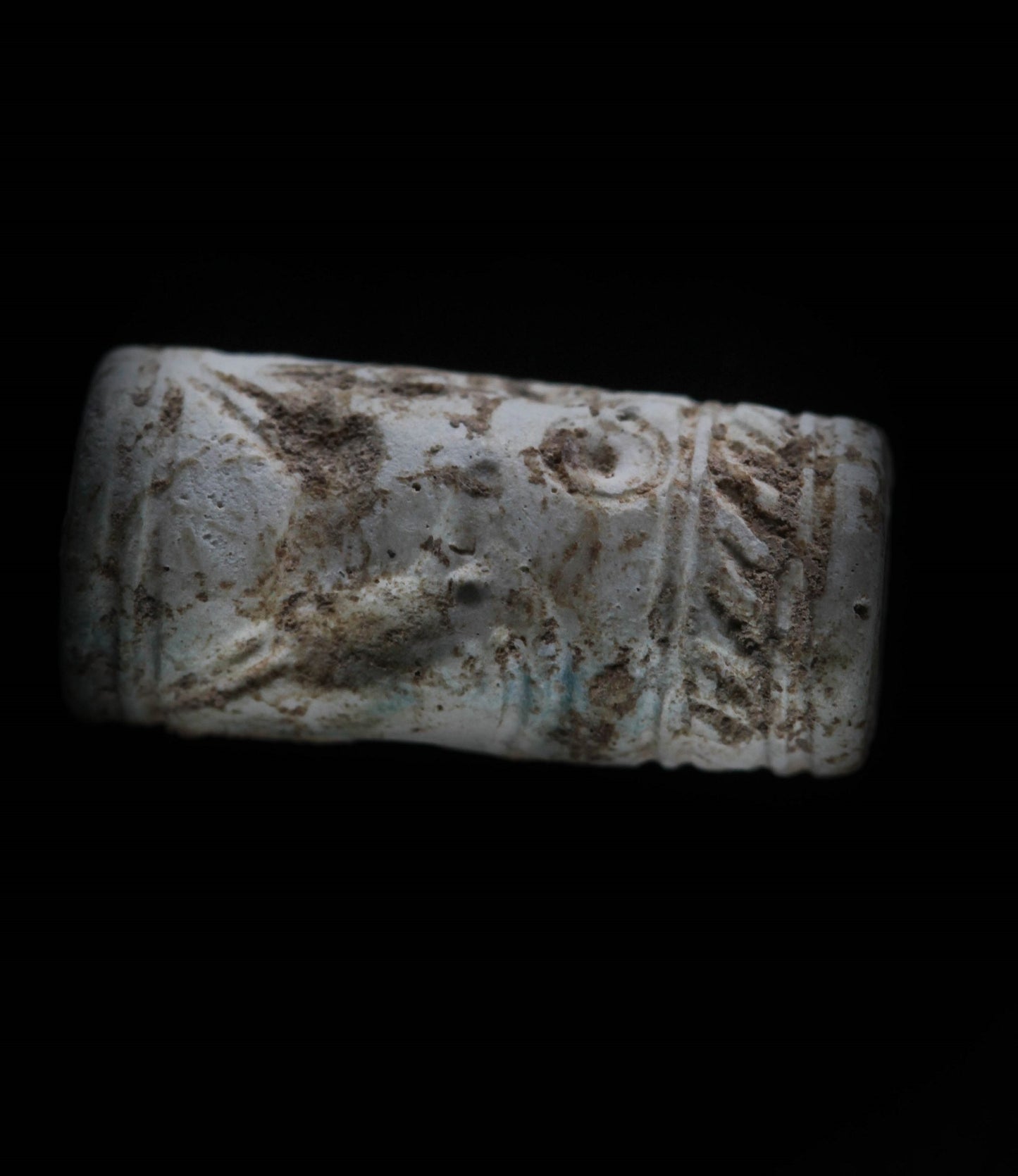 A FAIENCE CYLINDER SEAL