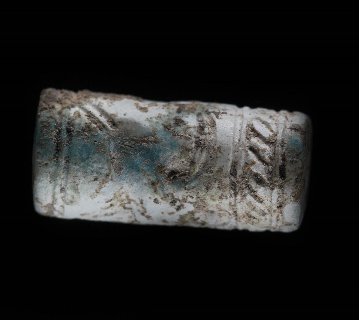 A FAIENCE CYLINDER SEAL