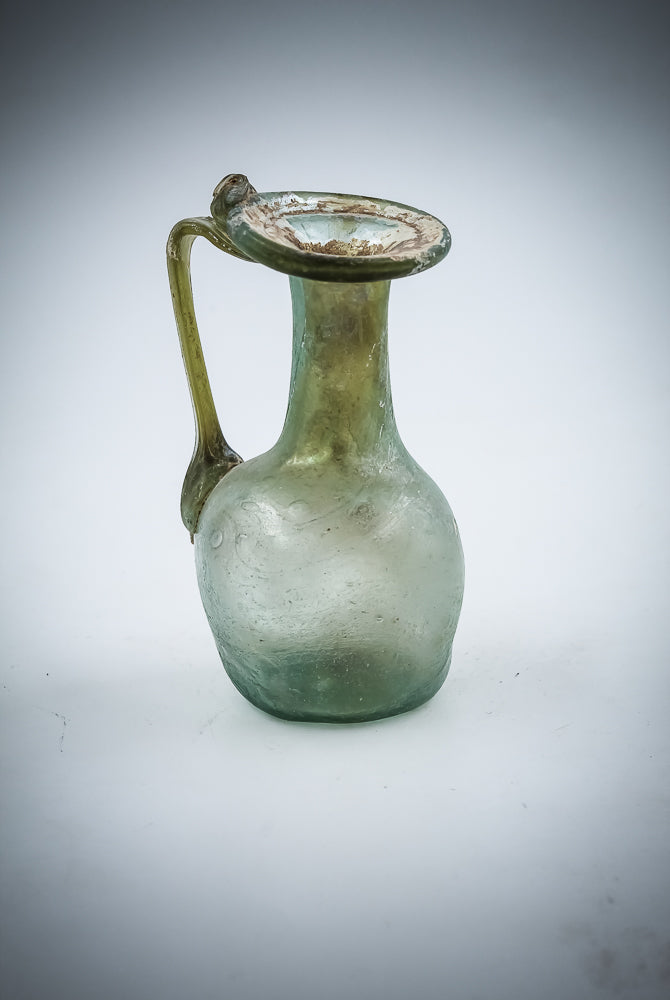 A Small Green Glass Juglet