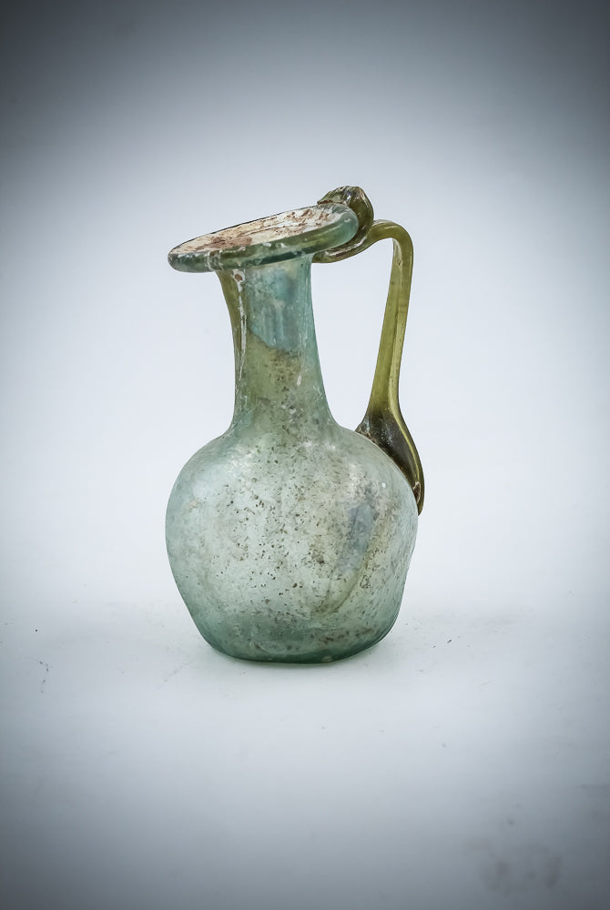 A Small Green Glass Juglet
