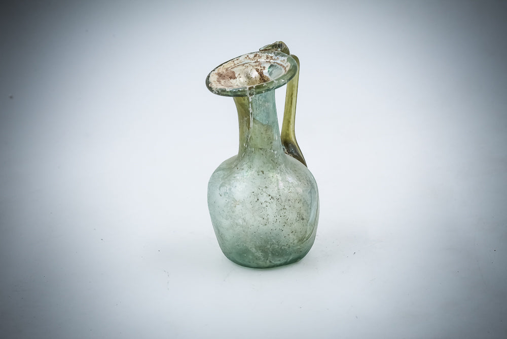A Small Green Glass Juglet