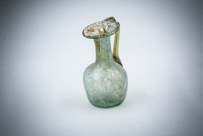 A Small Green Glass Juglet