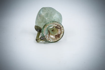 A Small Green Glass Juglet