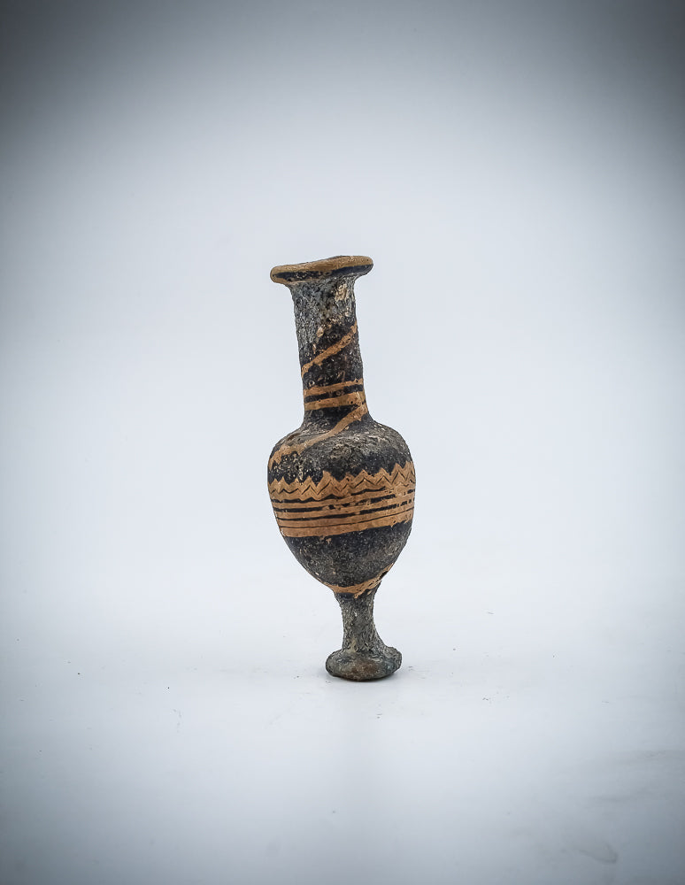 A Sand core Glass Alabastron