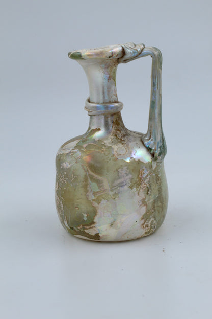 A Glass Juglet Covered With Silver Patina