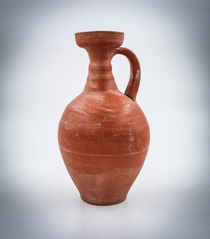 A NORTH-AFRICAN RED-SLIP TERRACOTTA DECANTER