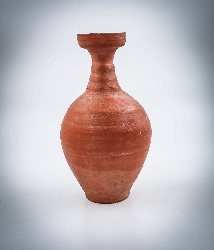 A NORTH-AFRICAN RED-SLIP TERRACOTTA DECANTER