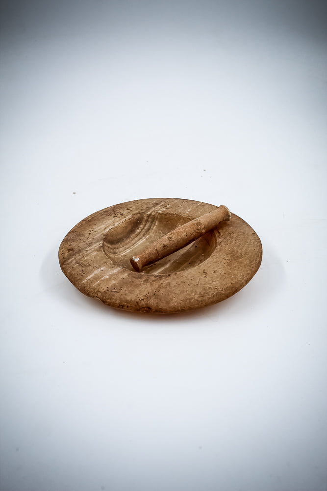 A Cosmetic Alabaster Bowl With Its Grinding Tool