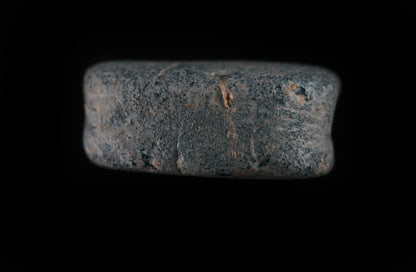 A Blue Glass Seal Covered With Nice White Patina